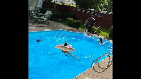 UPS delivery driver delivers a package right into a pool