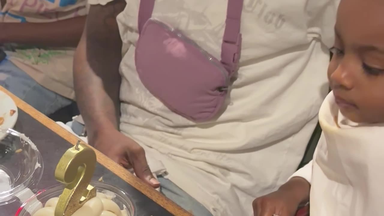 2-Year-Old Puts Out Candle With Her Hand