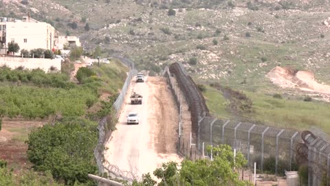Israeli soldiers seen on border with Syria a day after strike
