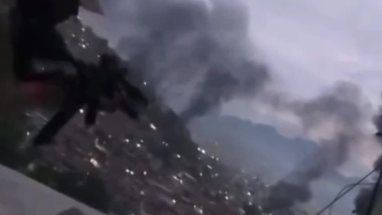 A member of "Red Command" opening fire against Brazilian Police