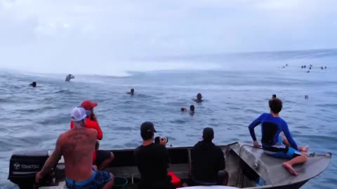 surfing big waves