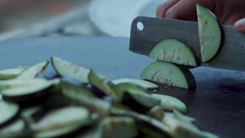 Cooking eggplant rolls filled with meat