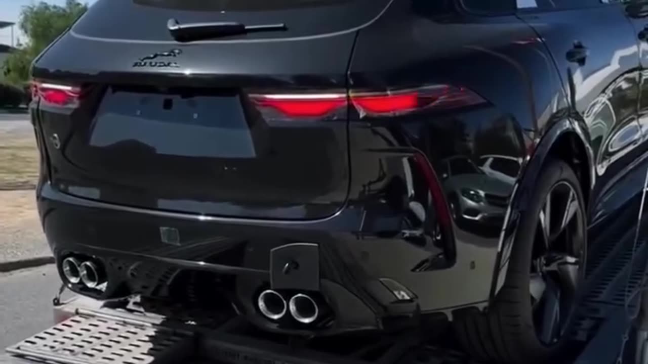 Jaguar SUV Makes a Dramatic Arrival from Open Trailer!