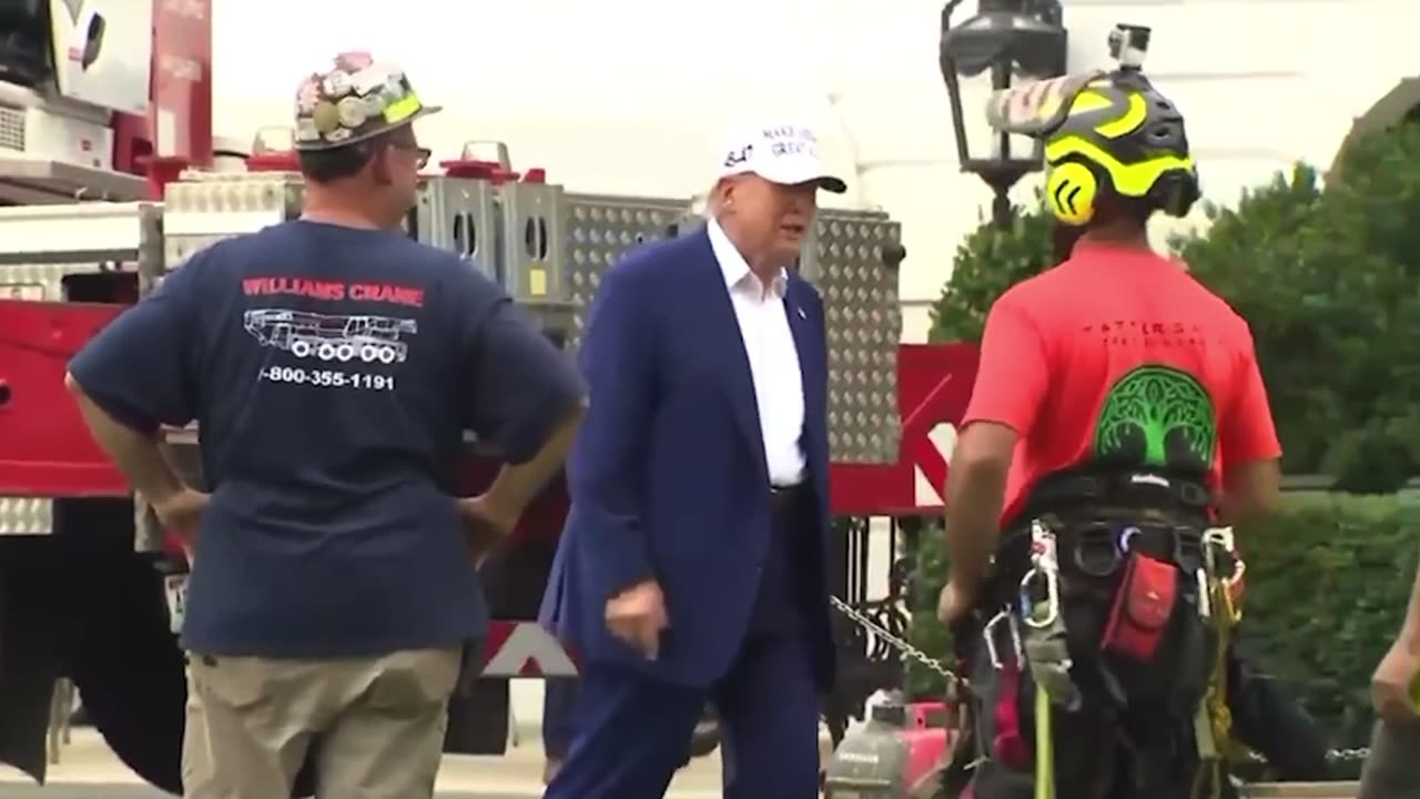 President Trump greets flag pole site construction team