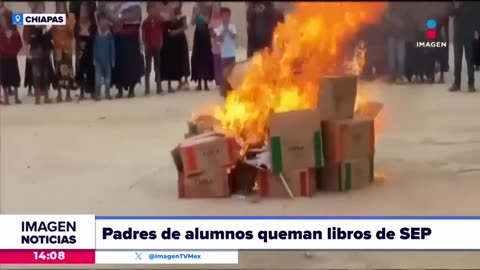 Parents of students enter a school and burn communist indoctrination books in Mexico 🇲🇽.