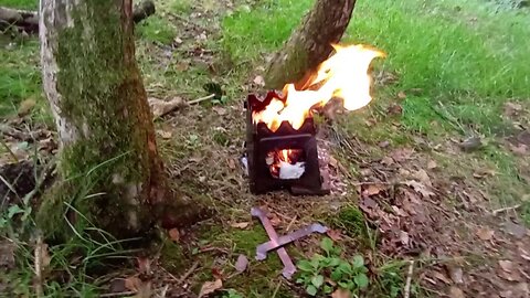 #wood burner , #food , #camp , burning moss to