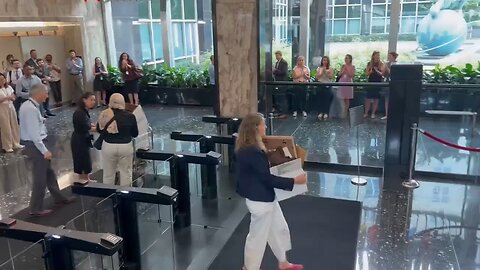 State Dept, showing employees leaving HQ after being fired in the mass cuts of 1300 employees