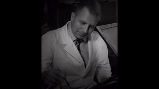 ARRB 1996—John Stringer views the JFK BRAIN AUTOPSY PHOTOS