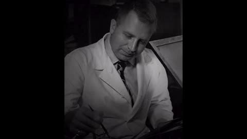 ARRB 1996—John Stringer views the JFK BRAIN AUTOPSY PHOTOS