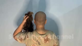 Woman headshave at her home