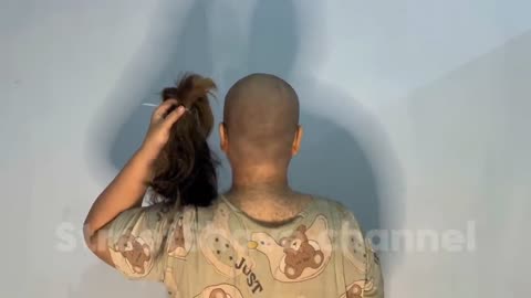 Woman headshave at her home