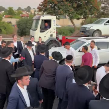 Fight breaks out as ultra-Orthodox Jews block road