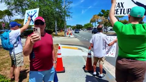 POV: Inside Look Elon Musk Tesla Protest Wearing a MAGA Hat DOGE