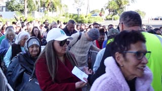 Long queues and large crowds of saints eagerly waiting to enter the building