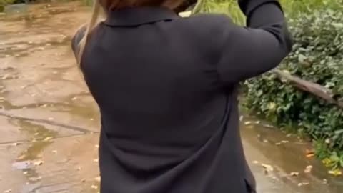Sudden Raccoon Jump to Her Shoulder