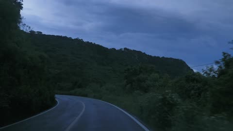 Traveling on a nature road at dusk