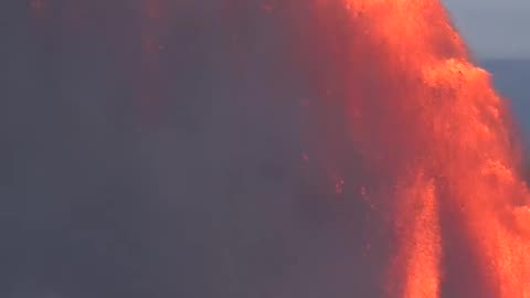 North Vent emits an enormous lava arch as Kilauea Volcano erupts