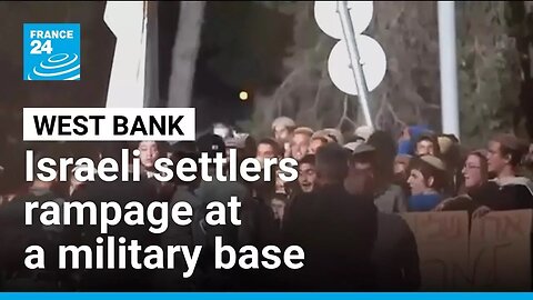 Israeli settlers rampage at a military base in the West Bank