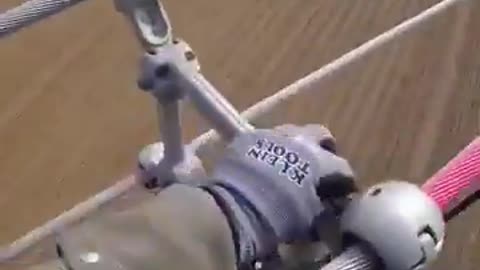 Watch as technicians replace powerline spacers mid-air—from a helicopter