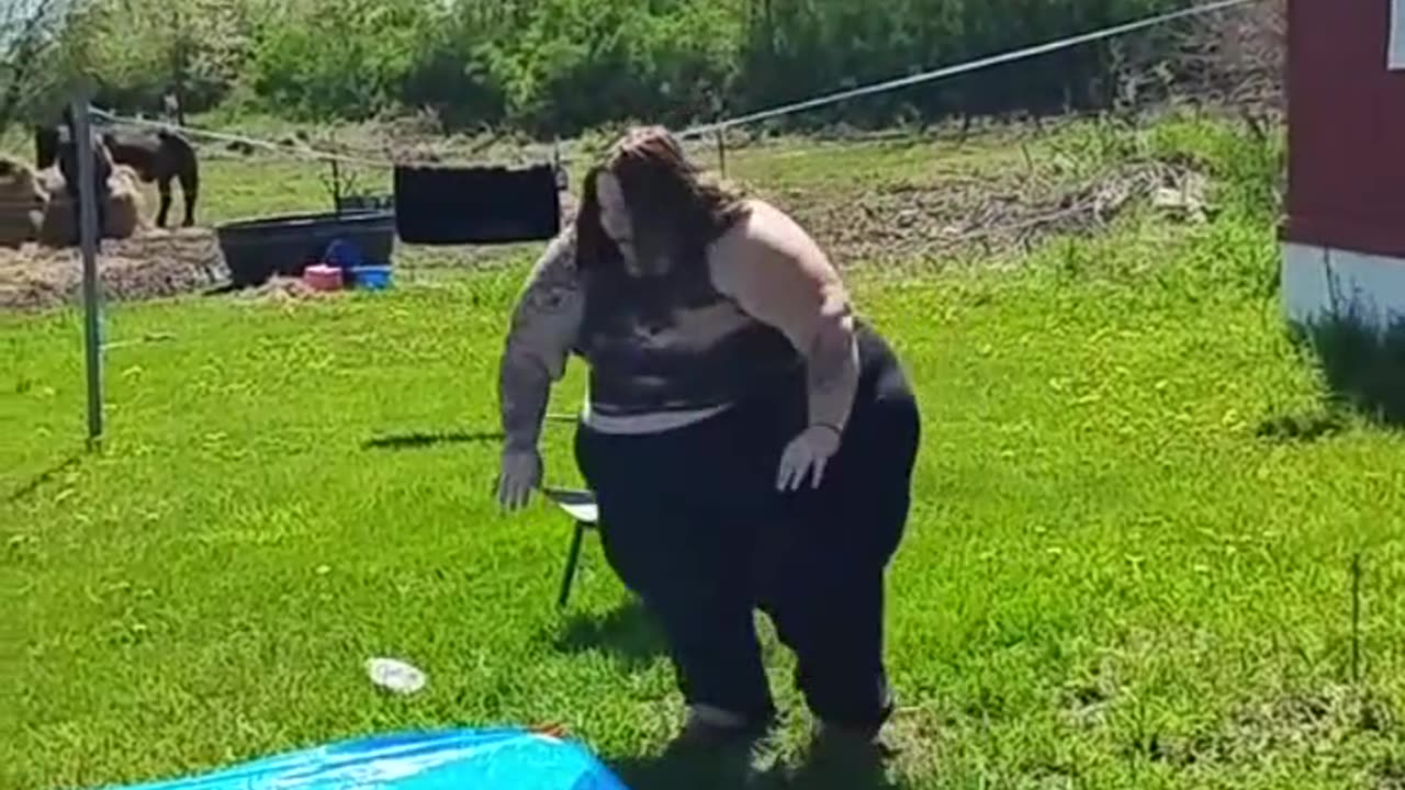 woman try's out the slip-n-slide