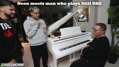Neon listens to the goat play