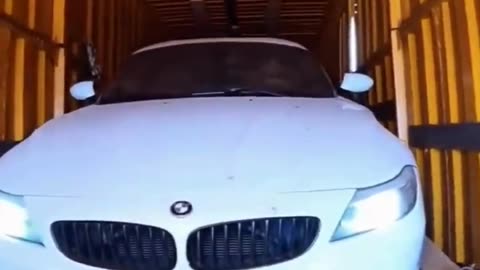 Epic Moment: BMW Exits Enclosed Trailer!