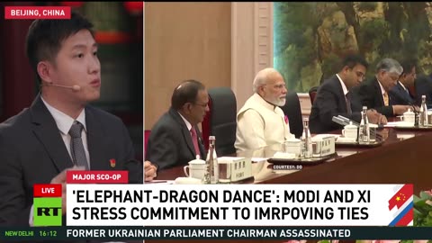 'The dragon and elephants should dance together' — Yang Sheng