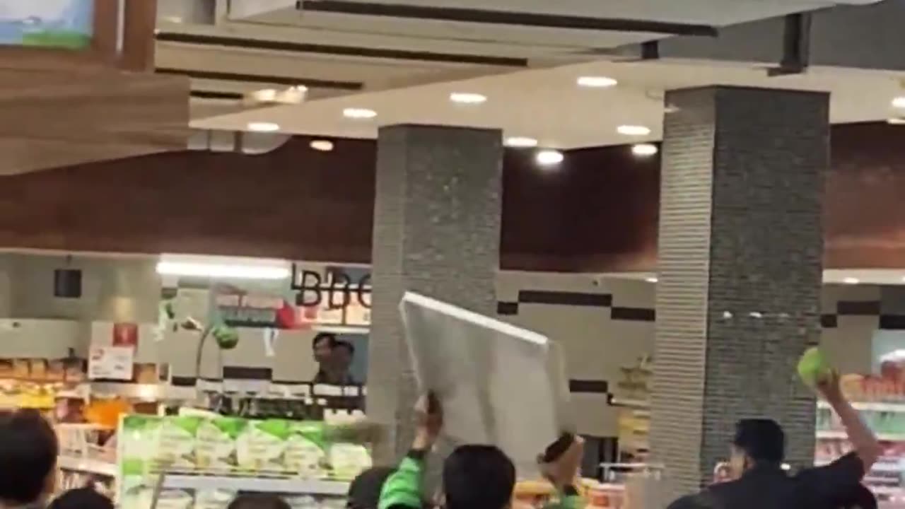 A man trashes a supermarket