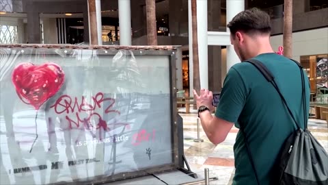 The story behind this Banksy mural, going to auction for a heartfelt cause