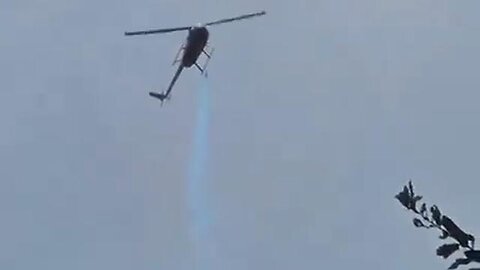 "Florida Woman Captures Shocking Footage of Helicopter Spraying Unknown Blue Chemical"
