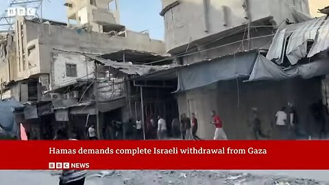 Gaza rescuers say at least 26 people killed after Israeli tanks open fire near aid centre