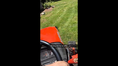 Bx2380 mowing the yard