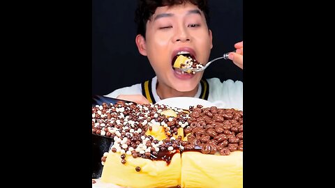 Cream pudding and chocolate pudding sprinkled with condensed milk, chocolate sauce and chocolate
