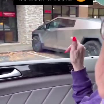Liberal Grandma & obvious MSNBC viewer goes absolutely nuts when seeing a parked Tesla