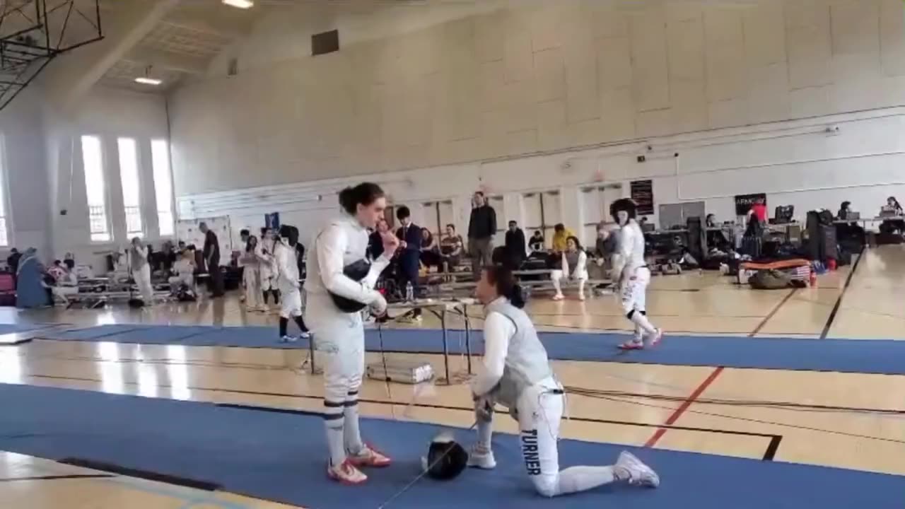 🤺🚨Historic Protest: Female Fencer Takes a Knee in Bout Against Male Opponent and Faces Immediate Disqualification...