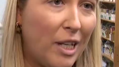 She's smiling while talking about the school abandoning its Catholic ethos for