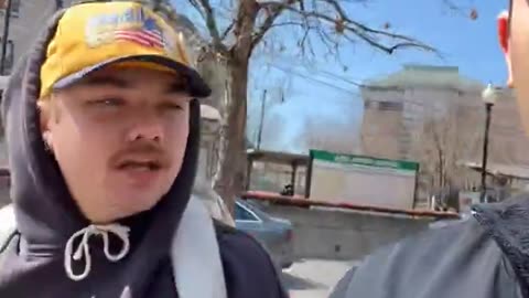 BEANER with painted finger nails calls yt man a Nazi for having a 45 Hat with American Flag