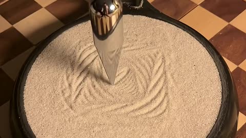 Pendulum Tracing Designs In The Sand