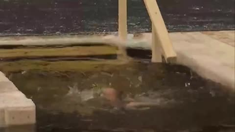 Putin traditionally dipped into the ice hole on Epiphany
