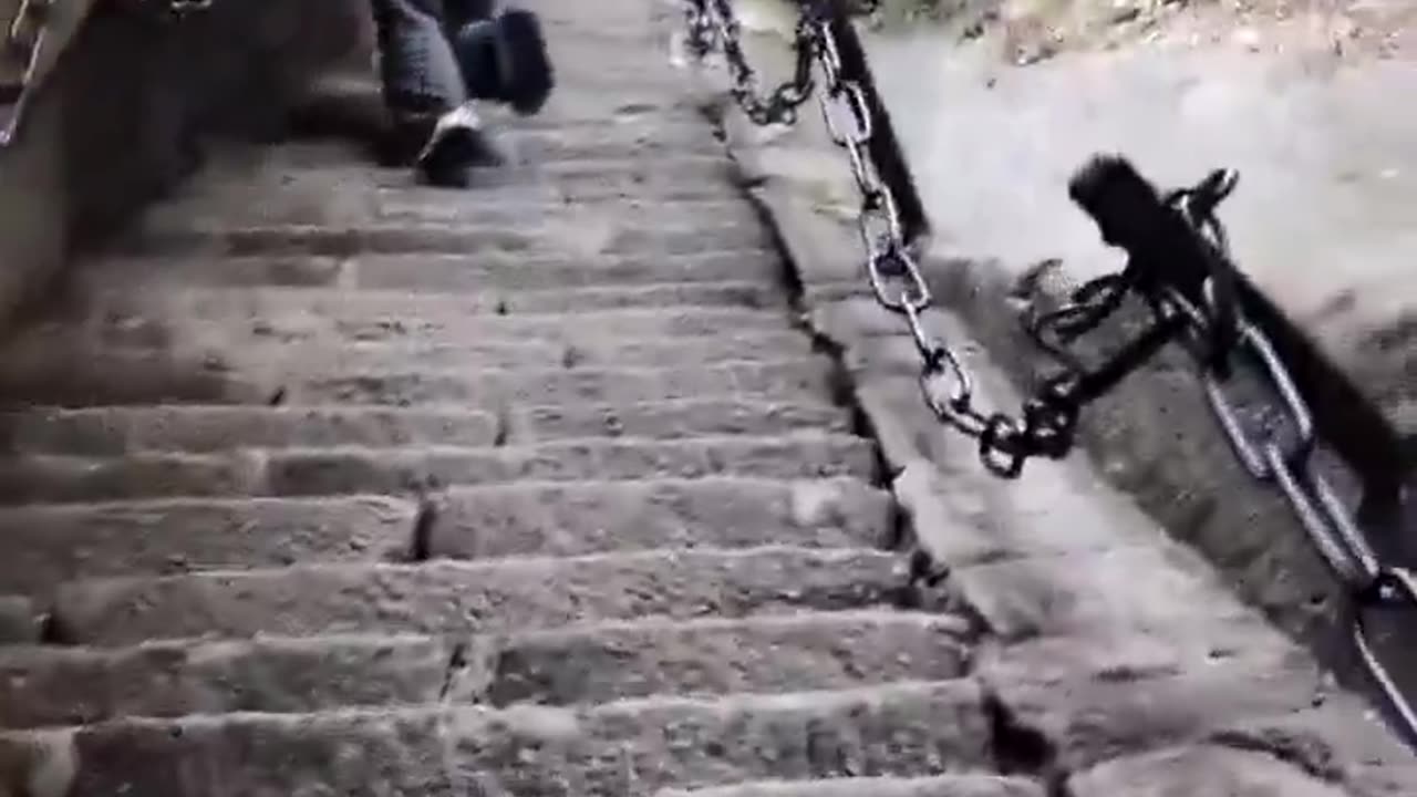 A PATH TO ASCEND MOUNT HUA IS CARVED INTO THE VERY STONE OF THE MOUNTAIN