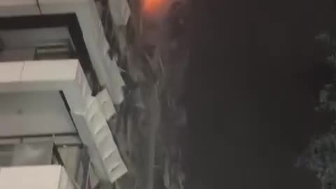 Extensive damage to a building that suffered a direct hit near Tel Aviv