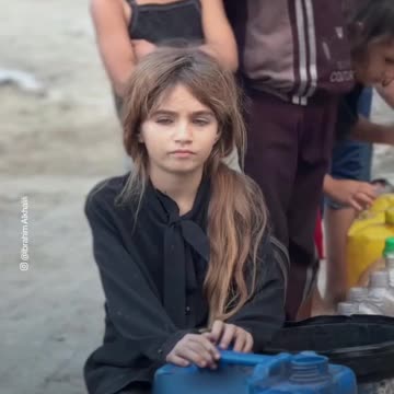 Scenes of children waiting for their turn in a queue to get water in the Gaza Strip