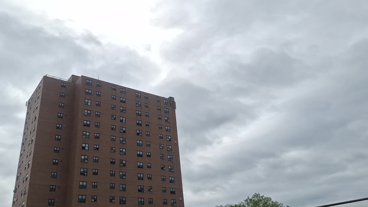 Light from the white sun and yellow sun behind the "clouds"