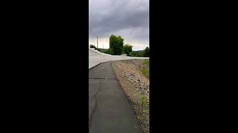 Riding along the Forty Fort River bike trails. making jokes about breaking my face.