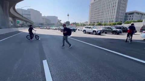 CNN news crew FORCED OUT OF THE AREA as LAPD attempts to deal with rioters.