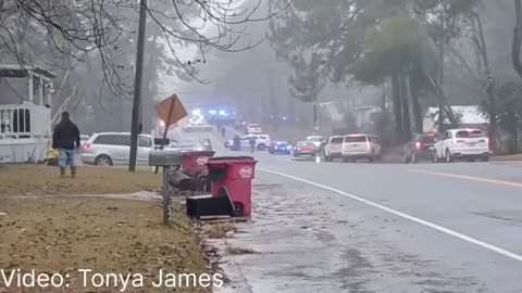 At least 2 police officers shot in Tifton, Georgia, suspect barricaded inside home.