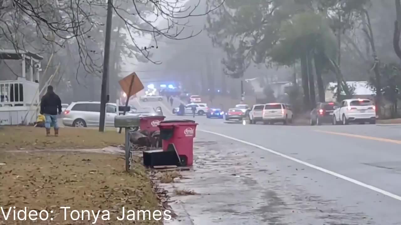 At least 2 police officers shot in Tifton, Georgia, suspect barricaded inside home.