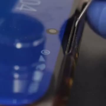 Smartphone phone shown under a microscope.