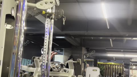 Gym bro doing cable bicep curls