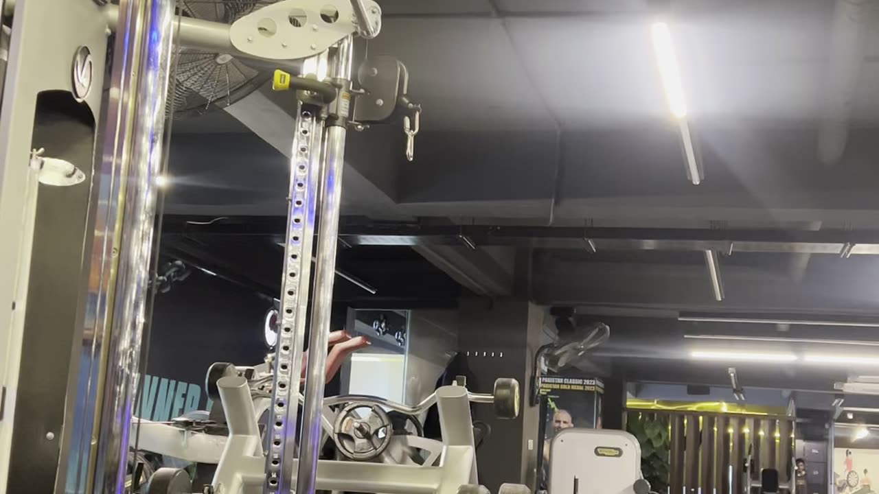Gym bro doing cable bicep curls